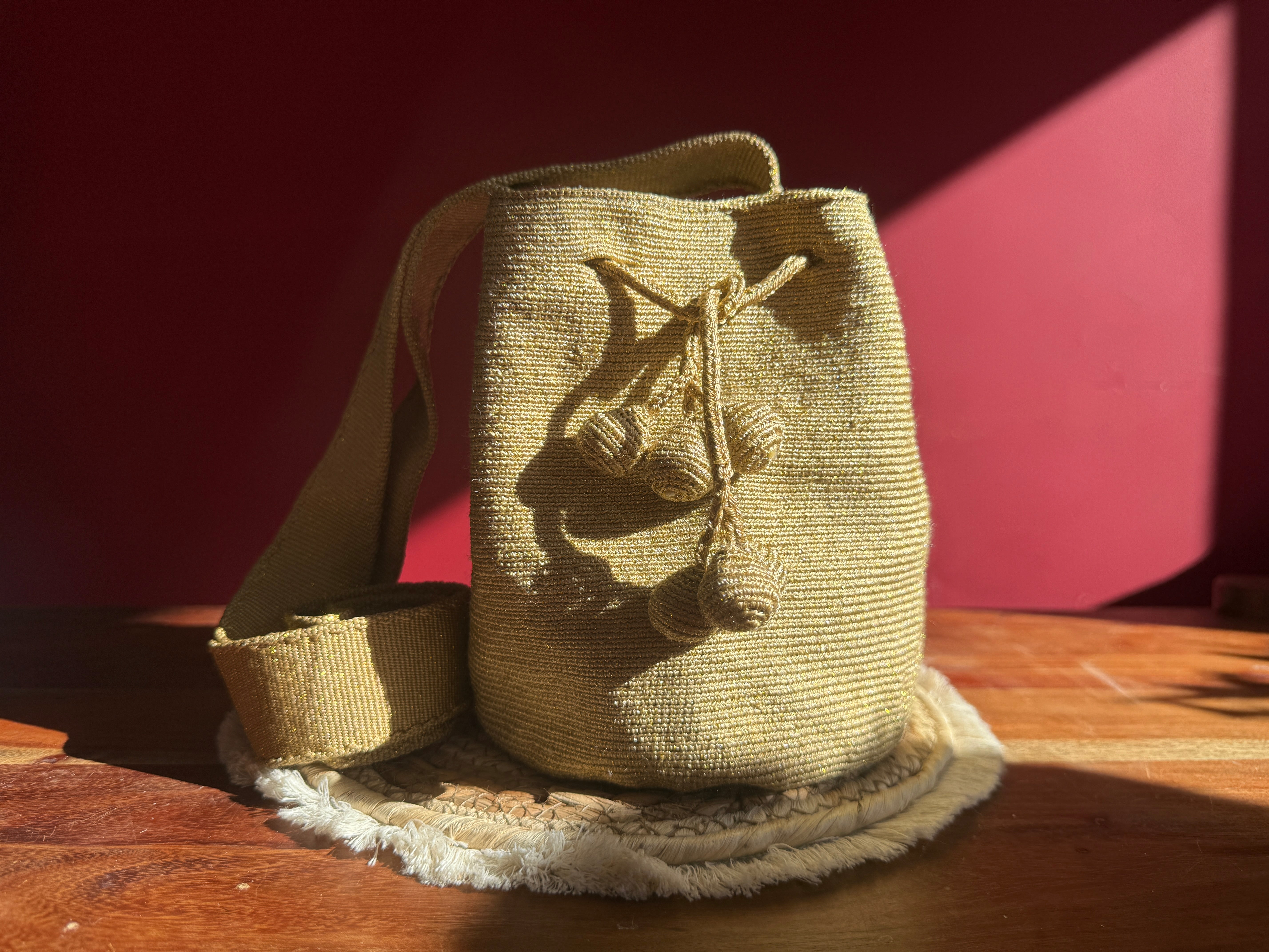El Dorado — golden ochre pompom closure